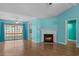 Cozy living room with a fireplace and sliding glass doors to the outside at 614 Cavandish Dr., Myrtle Beach, SC 29588