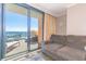 Enjoy ocean views from the private balcony with comfortable seating and a cozy sofa at 6900 N Ocean Blvd. # 513, Myrtle Beach, SC 29572