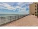 Sweeping ocean view from a large brick terrace with beach access at 6900 N Ocean Blvd. # 513, Myrtle Beach, SC 29572