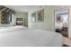 Comfortable bedroom with two double beds and view of the flat screen television in the adjacent room at 7100 N Ocean Blvd. # 221, Myrtle Beach, SC 29572