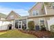 Spacious backyard with a grill and outdoor seating, ideal for entertaining and relaxation at 712 Painted Bunting Dr. # B, Murrells Inlet, SC 29576