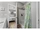 Bathroom with a shower and view into the primary bedroom at 712 Painted Bunting Dr. # B, Murrells Inlet, SC 29576