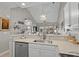 Well-lit kitchen area with stainless steel appliances and view into the living room at 712 Painted Bunting Dr. # B, Murrells Inlet, SC 29576