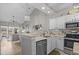 Well-lit kitchen with stainless appliances, sleek countertops, and an open view to the living area at 712 Painted Bunting Dr. # B, Murrells Inlet, SC 29576
