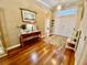 Beautiful foyer featuring hardwood floors, elegant decor, and a welcoming double door entrance at 7471 Balmore Dr. Sw, Sunset Beach, NC 28468