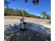 Street view shows mailbox and view of nearby golf course at 7471 Balmore Dr. Sw, Sunset Beach, NC 28468