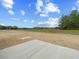 A vacant building lot ready for your dream home to be built with trees in the back at 813 Highway 67, Loris, SC 29569