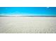 Wide, serene beach featuring soft sand and a tranquil ocean view under a partly cloudy sky at 9501 Shore Dr. # D-337, Myrtle Beach, SC 29572