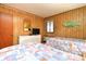 Inviting bedroom equipped with twin beds, a dresser, and a wall-mounted TV at 9501 Shore Dr. # D-337, Myrtle Beach, SC 29572