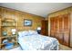 Comfortable bedroom with cozy accents, a view through to the bathroom and a closet at 9501 Shore Dr. # D-337, Myrtle Beach, SC 29572