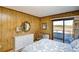 This cozy main bedroom features an outside view and a coastal vibe decor at 9501 Shore Dr. # D-337, Myrtle Beach, SC 29572