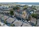 Aerial view showing the condo building, ample parking, and proximity to the beach and ocean at 9661 Shore Dr. # B-22, Myrtle Beach, SC 29572