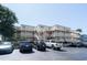 Exterior view of the building with stairs and parking spaces for residents and visitors at 9661 Shore Dr. # B-22, Myrtle Beach, SC 29572