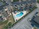 Aerial view of the community pool with lounge chairs and manicured landscaping at 9661 Shore Dr. # B-22, Myrtle Beach, SC 29572