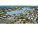 Aerial view of a lakefront community near a golf course, beach, and green space at 9671 Stillwater Ct., Myrtle Beach, SC 29572