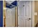 Bathroom featuring a framed glass shower and a white door with gold hardware at 9671 Stillwater Ct., Myrtle Beach, SC 29572