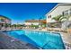 Inviting community pool area with ample lounge chairs, and lush landscaping for relaxation and enjoyment at 9671 Stillwater Ct., Myrtle Beach, SC 29572