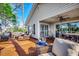 Relaxing back deck featuring a seating area, ceiling fan, and access to the home's interior at 9671 Stillwater Ct., Myrtle Beach, SC 29572