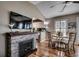 Open floor plan with fireplace, TV, eat-in dining area and kitchen with modern appliances and great natural light at 9671 Stillwater Ct., Myrtle Beach, SC 29572