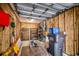 Organized garage space, featuring storage shelves, recycling bin, clear kayak, and other outdoor equipment at 9671 Stillwater Ct., Myrtle Beach, SC 29572