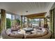 Inviting circular outdoor seating area features a firepit and views of the surrounding landscape at 9671 Stillwater Ct., Myrtle Beach, SC 29572