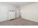 Bedroom with white dresser and open door to walk-in closet at 1004 Garden Sprout Dr, Galivants Ferry, SC 29544