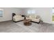 Inviting living area with contemporary decor, natural light, and views of the outdoors at 1004 Garden Sprout Dr, Galivants Ferry, SC 29544