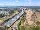 Scenic aerial view of Golf Course Community with ponds and manicured landscaping at 1033 World Tour Blvd. # 101-A, Myrtle Beach, SC 29579