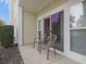 Balcony with outdoor seating with view of manicured greenery at 1033 World Tour Blvd. # 101-A, Myrtle Beach, SC 29579