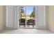 Balcony with outdoor seating area and view of manicured greenery at 1033 World Tour Blvd. # 101-A, Myrtle Beach, SC 29579