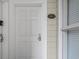 Secured white front door with modern digital lock and '101 A' address plate at 1033 World Tour Blvd. # 101-A, Myrtle Beach, SC 29579