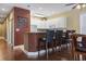Kitchen bar area with chairs and dining area at 1033 World Tour Blvd. # 101-A, Myrtle Beach, SC 29579