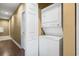 A laundry room featuring a stacked washer and dryer at 1033 World Tour Blvd. # 101-A, Myrtle Beach, SC 29579