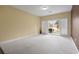 Neutral living room featuring lots of natural light and beige carpet at 1033 World Tour Blvd. # 101-A, Myrtle Beach, SC 29579