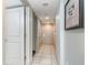 Hallway with tile floors, closet and doorways leading to rooms at 107 Ocean Blvd. S # 1707, Myrtle Beach, SC 29577