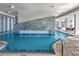 The indoor pool boasts waterfall features and beautiful tile work at 107 Ocean Blvd. S # 1707, Myrtle Beach, SC 29577