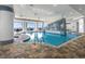 Stunning indoor pool area with ample lounge seating and an ocean view at 107 Ocean Blvd. S # 1707, Myrtle Beach, SC 29577