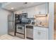 Efficient kitchen features stainless steel appliances and granite countertops at 107 Ocean Blvd. S # 1707, Myrtle Beach, SC 29577