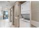 Laundry area with stacked washer and dryer and closet for storage at 107 Ocean Blvd. S # 1707, Myrtle Beach, SC 29577