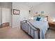 Cozy bedroom with a brass bed frame, carpet, and coastal-themed decor at 109 Astoria Park Loop, Conway, SC 29526