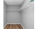 Walk-in closet with wire shelving and wood-look floors at 1108 Patricia Ct., Conway, SC 29526