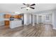 Open concept living space features wood-look floors and a view into the kitchen at 1108 Patricia Ct., Conway, SC 29526