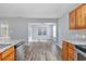 Spacious living room provides natural light and view into the kitchen at 1108 Patricia Ct., Conway, SC 29526