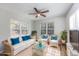 Bright and airy living room with comfortable seating, large windows, and stylish decor, perfect for relaxation at 1108 Patricia Ct., Conway, SC 29526