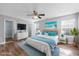Comfortable main bedroom with stylish decor, a ceiling fan, and lots of natural light, creating a serene retreat at 1108 Patricia Ct., Conway, SC 29526