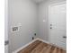 Mud room has wood-look floors and a door leading outside at 1108 Patricia Ct., Conway, SC 29526