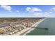 Desirable aerial view of homes along the beach with easy access to the pier and scenic views of the marsh at 132 Garden City Retreat Dr., Murrells Inlet, SC 29576