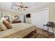 A bedroom with a wooden bed frame, closet, and dresser at 132 Garden City Retreat Dr., Murrells Inlet, SC 29576