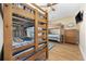 Bedroom featuring a bunk bed and a TV at 132 Garden City Retreat Dr., Murrells Inlet, SC 29576