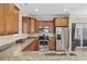 Well-equipped kitchen featuring stainless steel appliances and attractive granite countertops at 132 Garden City Retreat Dr., Murrells Inlet, SC 29576